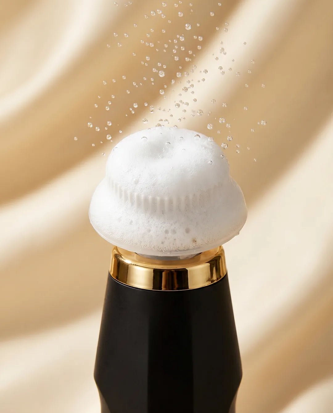 Dense white CO2 micro-foam blooming on the head of the SkinFusion applicator device